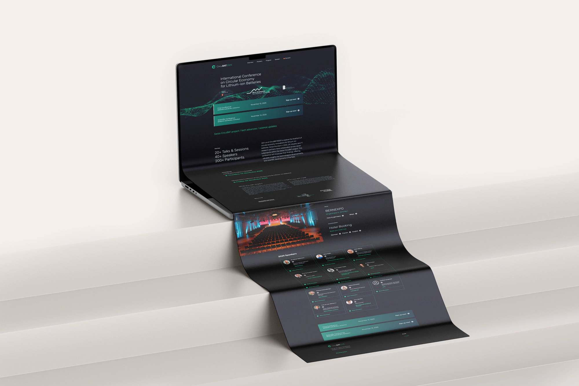Gefaltetes Programm der CircuBAT2025 Conference vor einem Laptop